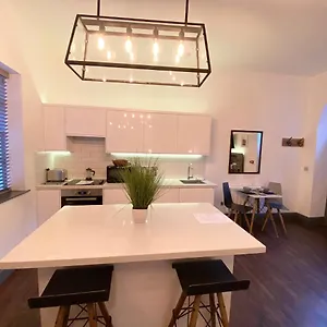 At The Coach House Apartment